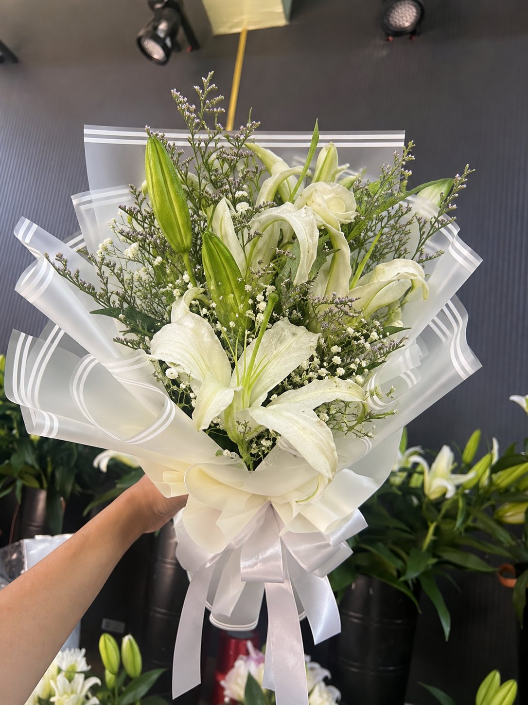 The Ethereal Grace: Pure White Lily & Statice Bouquet